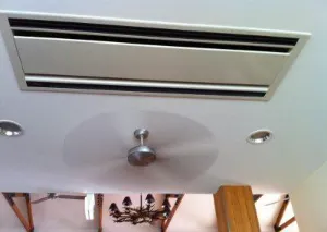 Ducted fan coil installed in bulkhead, North Lakes Retirement Resort